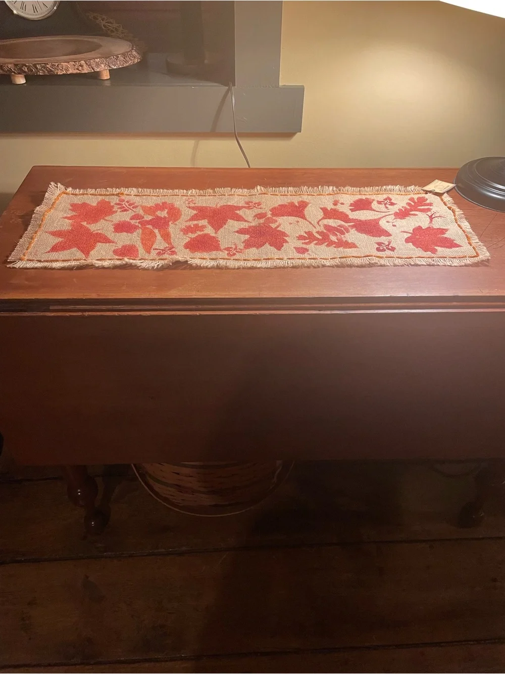 Beige burlap hand stenciled table runner with yarn stitched